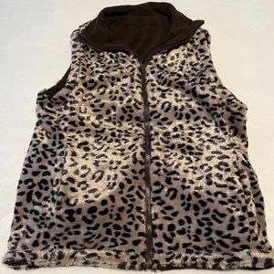 Reversible vest leopard print on one side brown on the other.